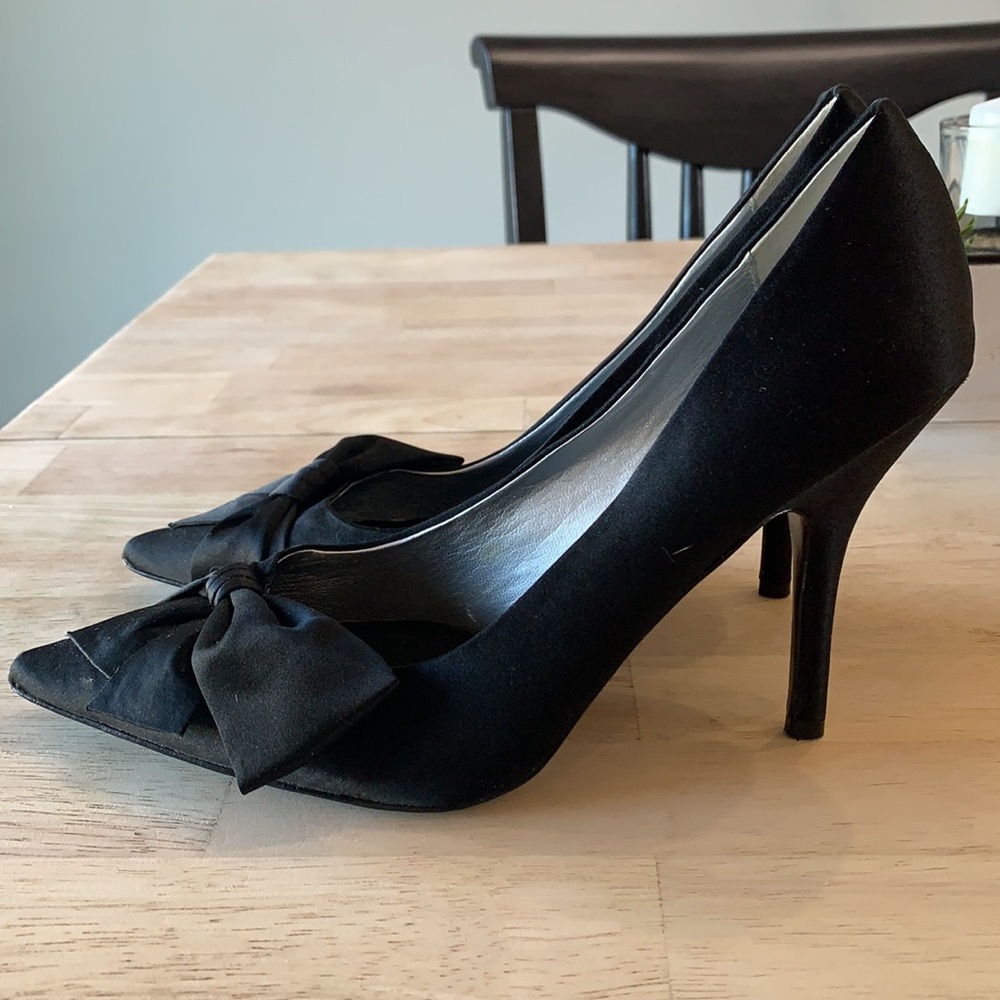 Black satin pumps